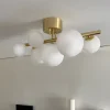Molekyl 7-lys takplafond messing/opal